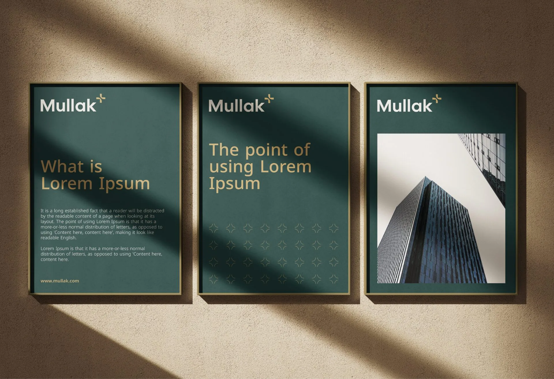 Three framed Mullak+ posters in teal with typography and architecture, on a sunlit beige wall